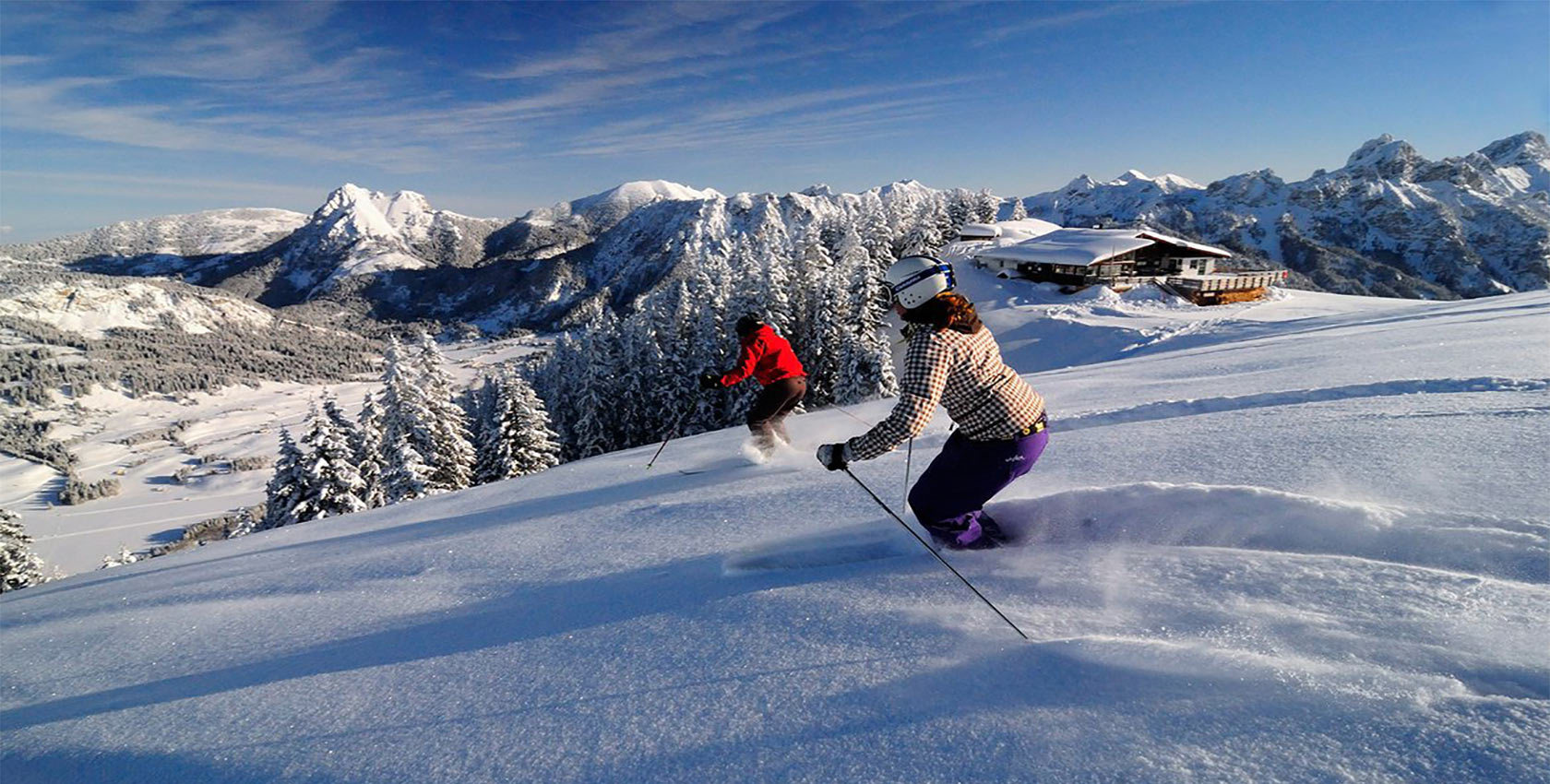 Skifahren und Snowboardfahren in Tirol beim Skiurlaub 